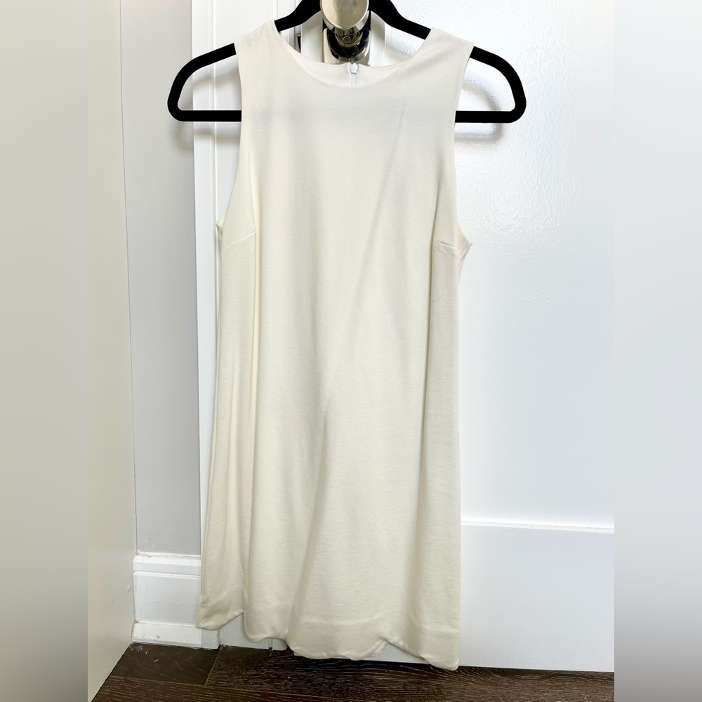 Aqua white dress with scalloped edge bottom. Never worn - NWT
